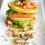 Green Apple Salmon Avocado Salad on a long white plate.