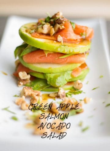 Green Apple Salmon Avocado Salad on a long white plate.