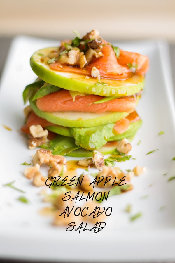 Green Apple Salmon Avocado Salad on a long white plate.