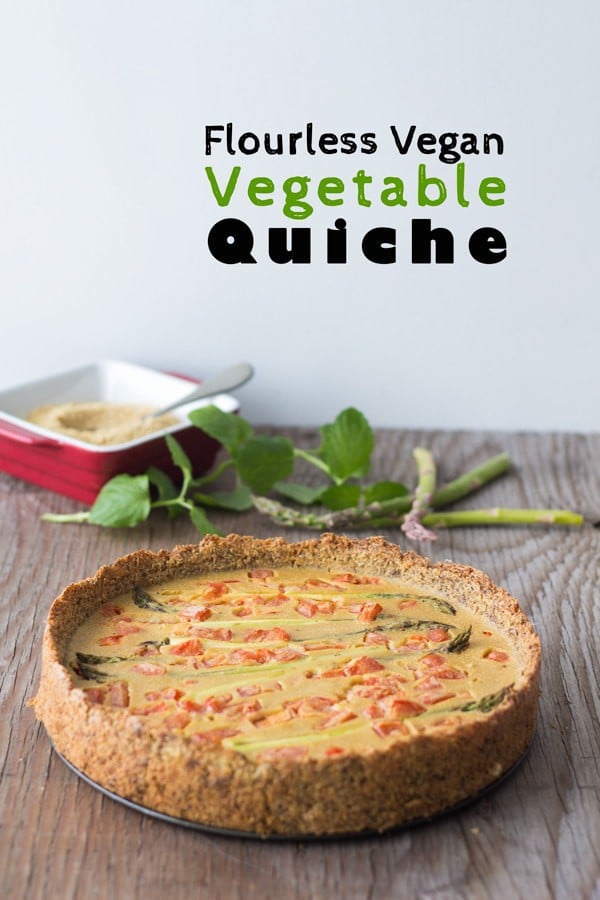 Flourless Vegan Vegetable Quiche on a wooden table.