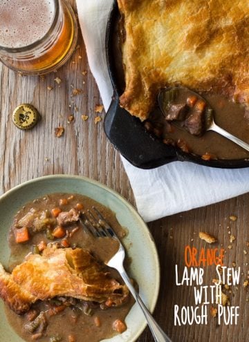 Top view of Orange Lamb Stew with Rough Puff, a piece of stew on a plate, and a glass of beer with text overlay.
