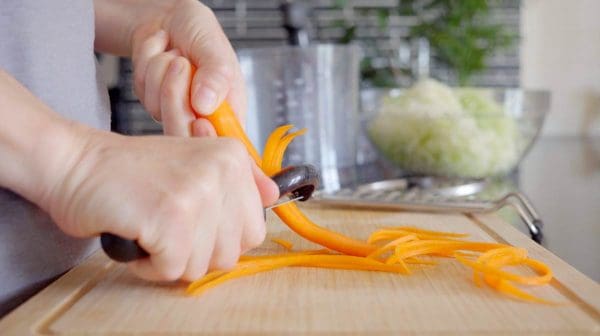 julienning carrot with a julienne peeler