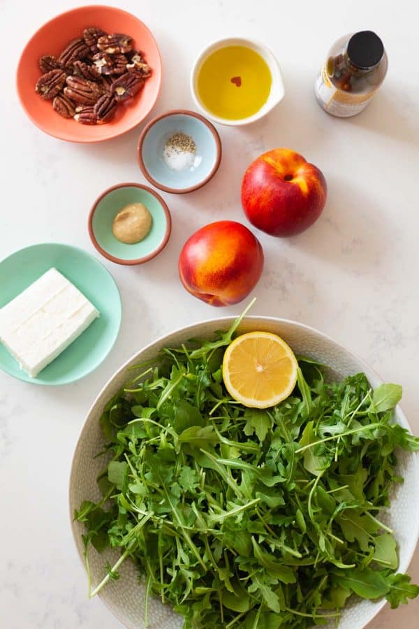 all ingredients for the Nectarine Arugula Salad as one flat lay