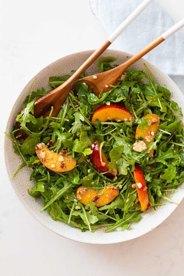 Mixed Nectarine Arugula Salad in a bowl 