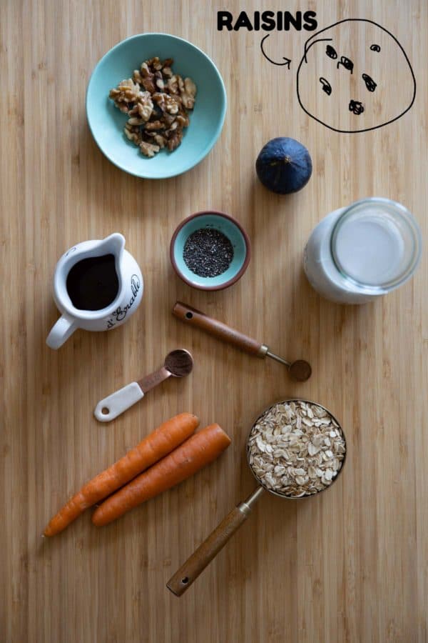 Individual ingredients for carrot cake oatmeal laid out on a kitchen counter.