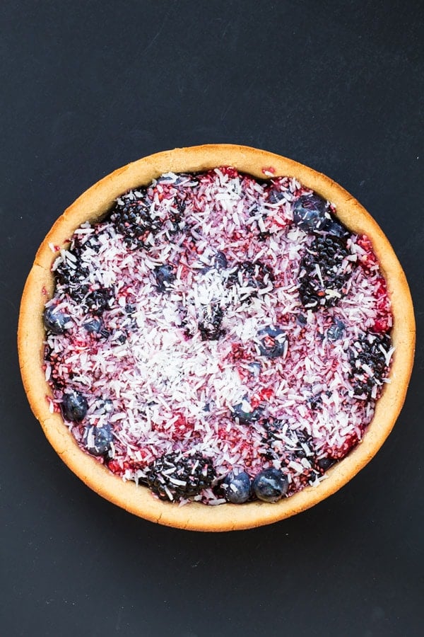 Top view of Healthy Berry Cake on a black background.
