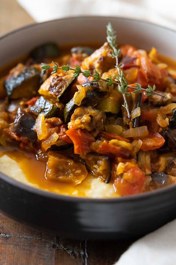 Closeup photo of texture of Ratatouille with creamy polenta.