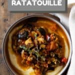 Ratatouille with polenta in a bowl and title of recipe as text overlay for pinterest.