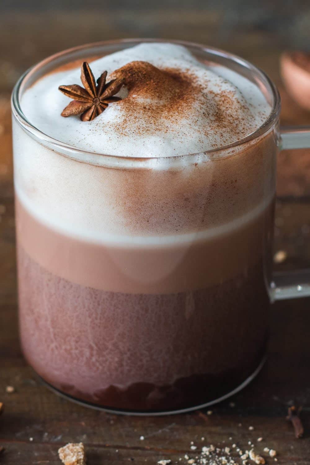 Mexican Hot Chocolate with frothed milk in a glass cup