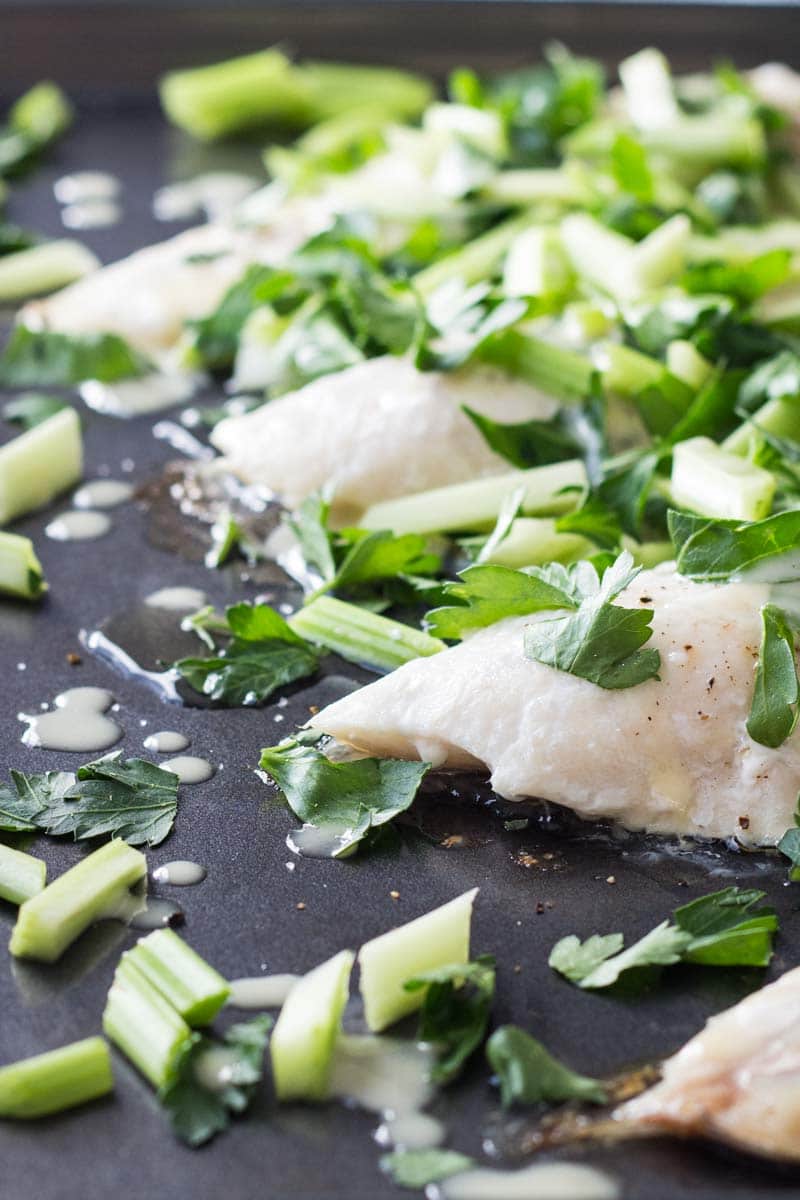 Close up of Snapper Fillet With Celery Parsley Salad to show texture.