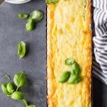 smoked salmon asparagus quiche in rectangular baking pan