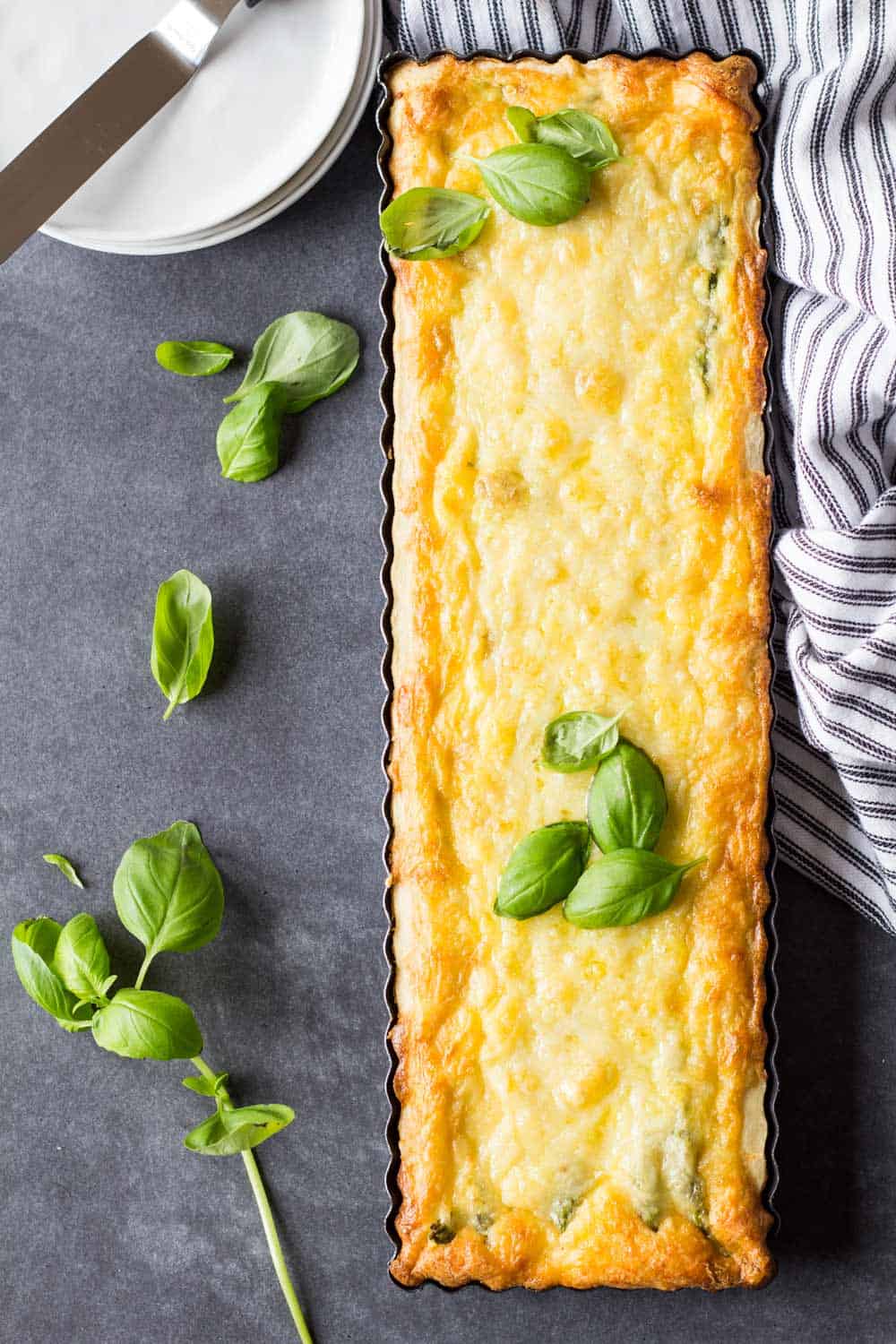 smoked salmon asparagus quiche in rectangular baking pan