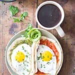 Huevos Divorciados - tortilla with salsa verde with egg and tortilla with salsa roja with egg