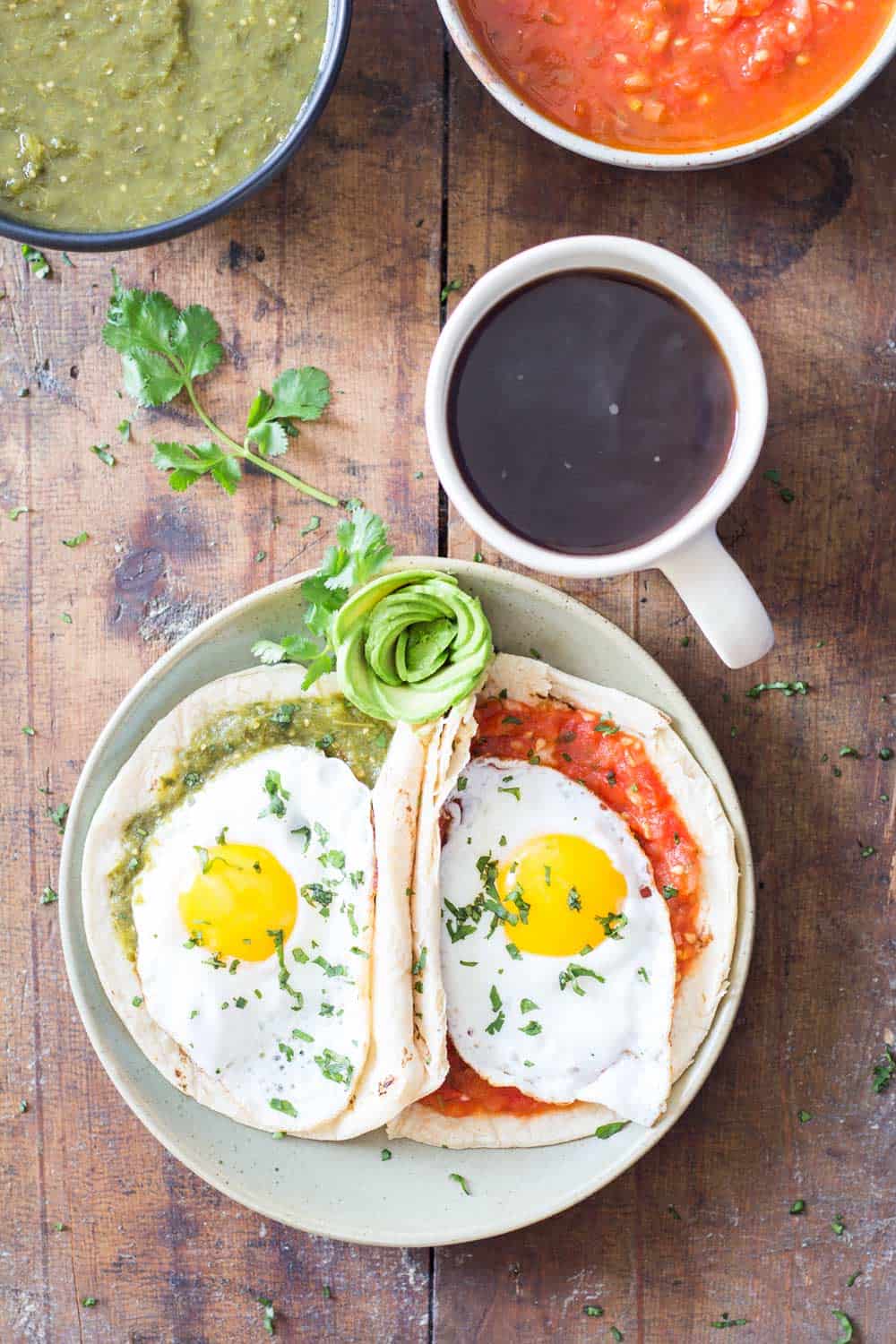 Huevos Divorciados - tortilla with salsa verde with egg and tortilla with salsa roja with egg