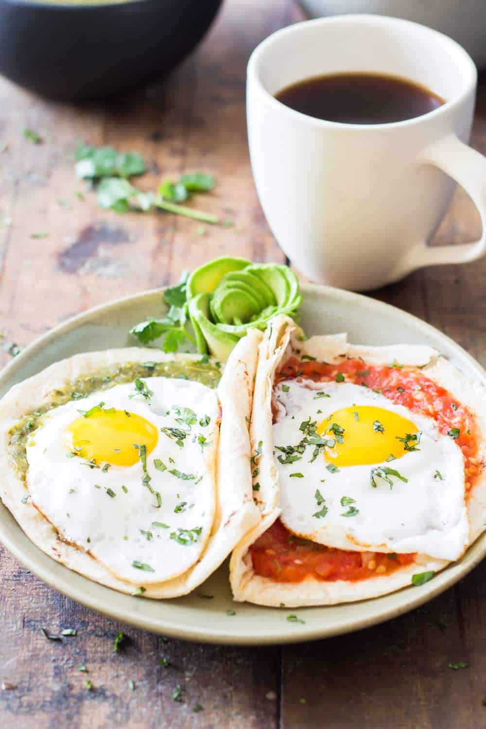 Huevos Divorciados on a green plate