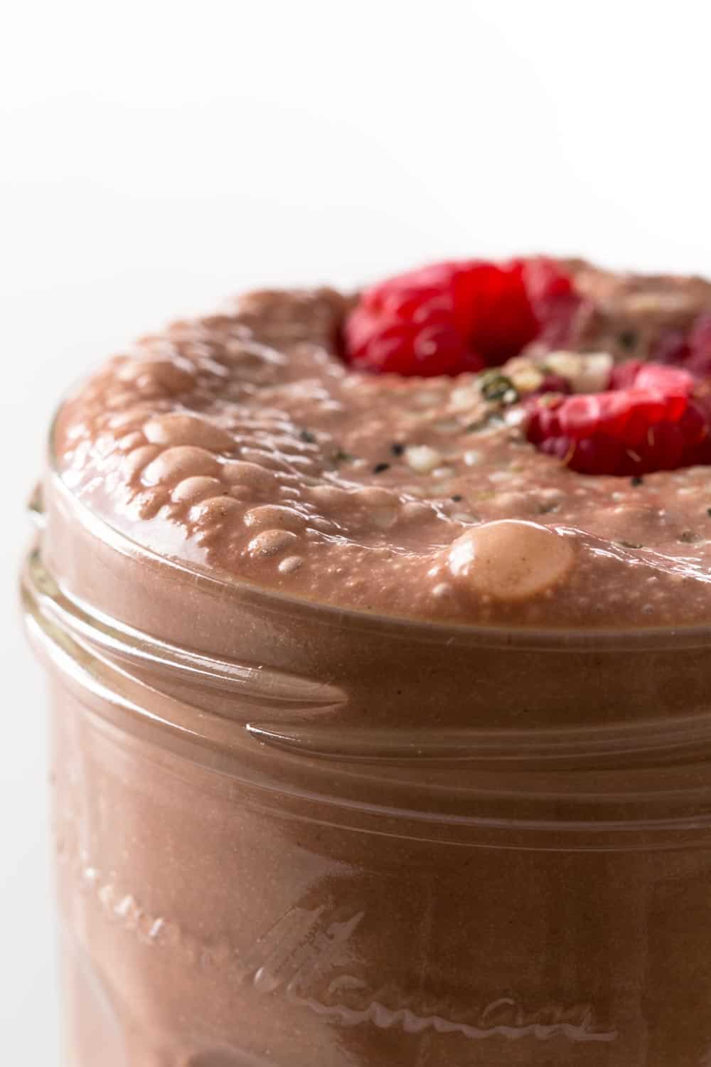 Chocolate Peanut Butter Banana Smoothie on top of Vegan Overnight Oats.