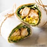 Healthy Chicken Wrap sliced in two, tied with jute twine.