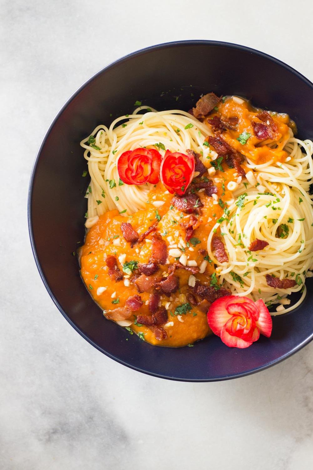 Bowl of spaghetti with Butternut Squash Pasta Sauce with Bacon.