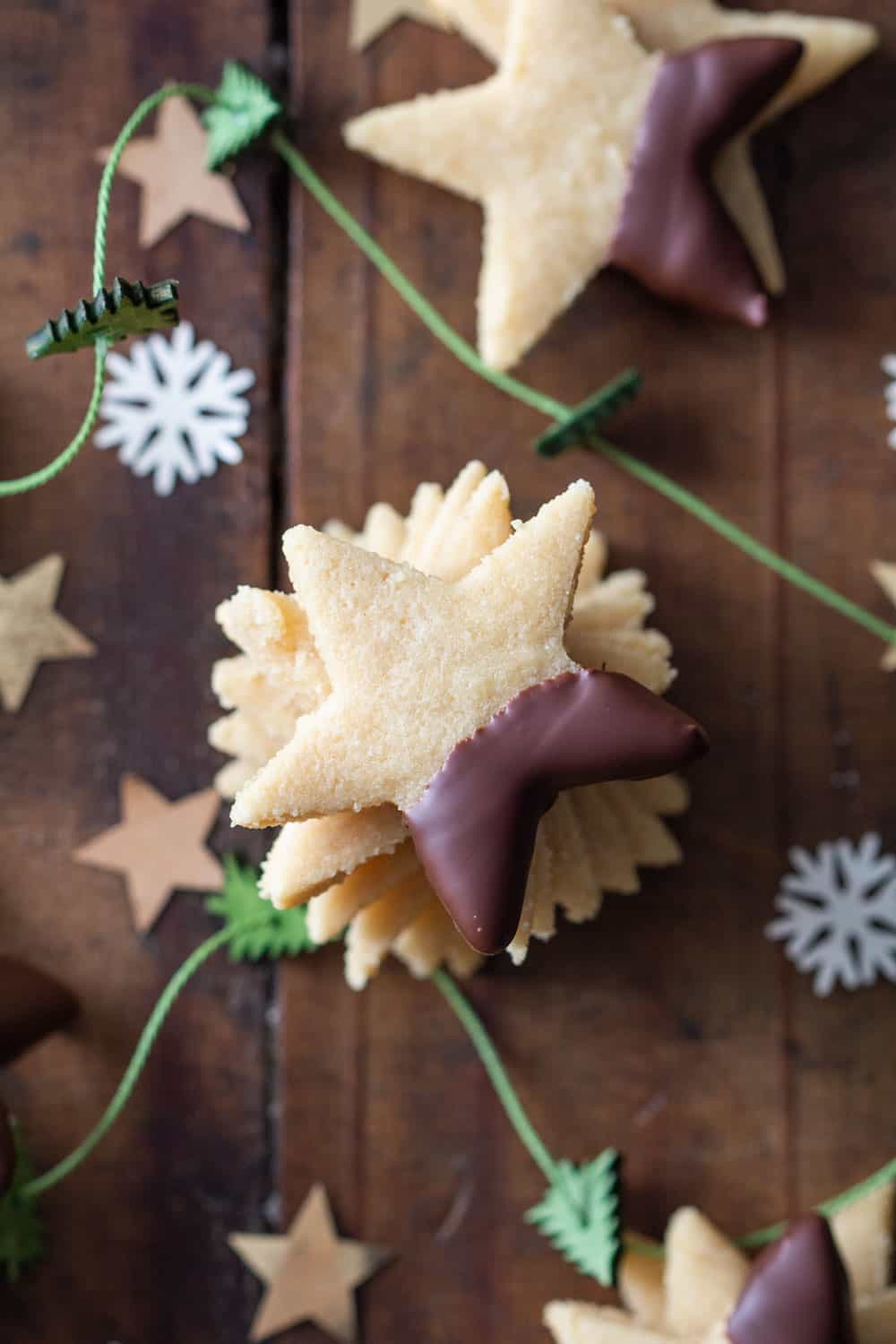 Almond Flour Cookies stacked and arranged on a wooden table