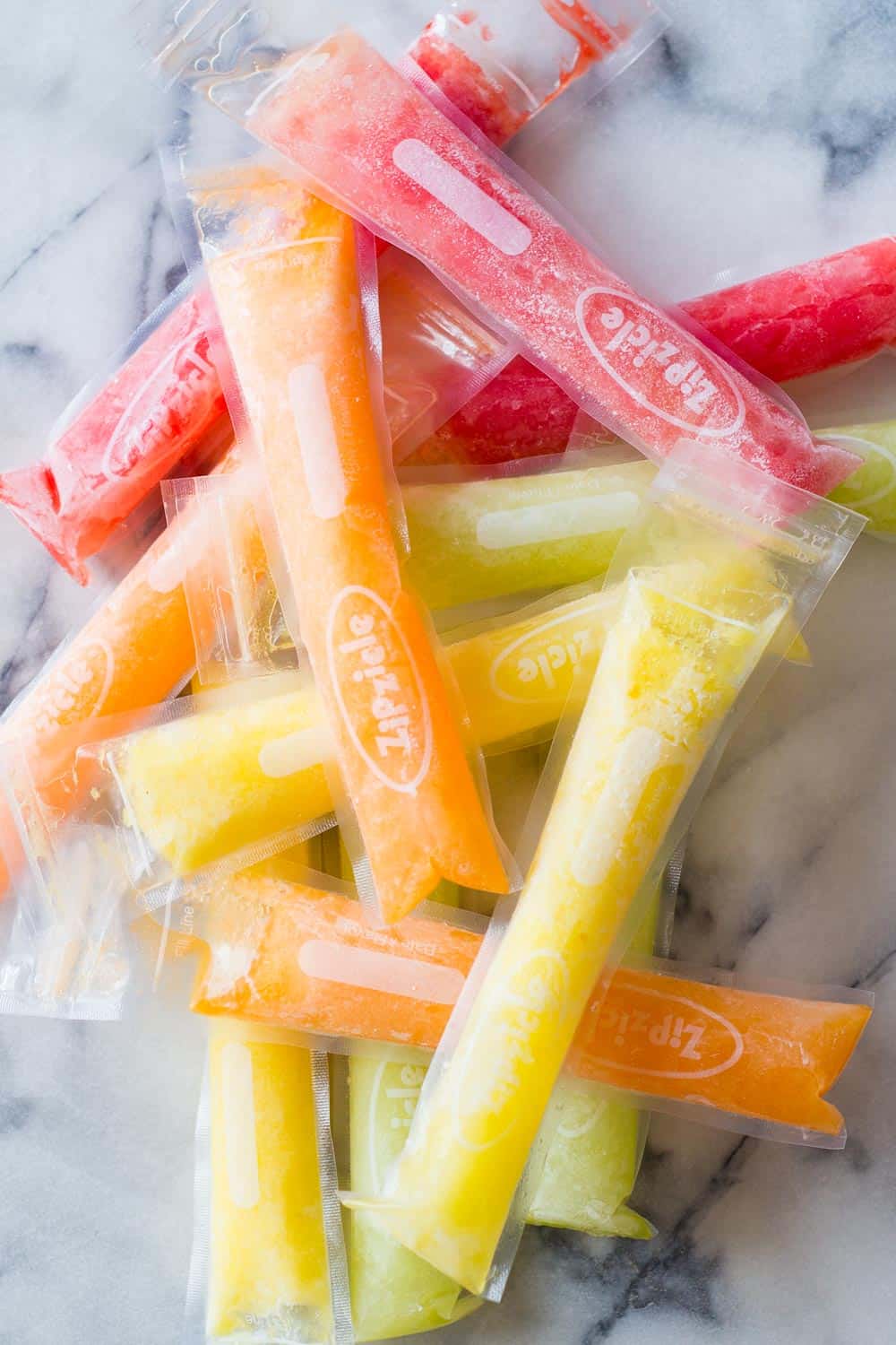 Sugar-free ice pops with vibrant colors thanks to watermelon, honeydew, cantaloupe and pineapple. 
