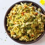 Instant Pot Chicken and Rice close-up on a wooden plate.