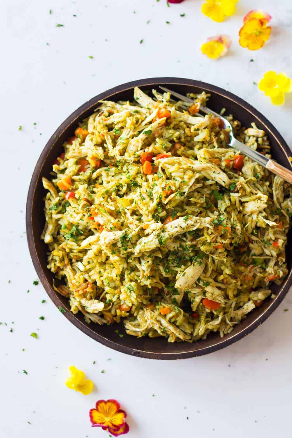 Instant Pot Chicken and Rice close-up on a wooden plate.