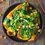 Kale Chickpea Quinoa Stuffed Sweet Potato with green sauce