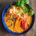 Coconut curry soup in a blue bowl