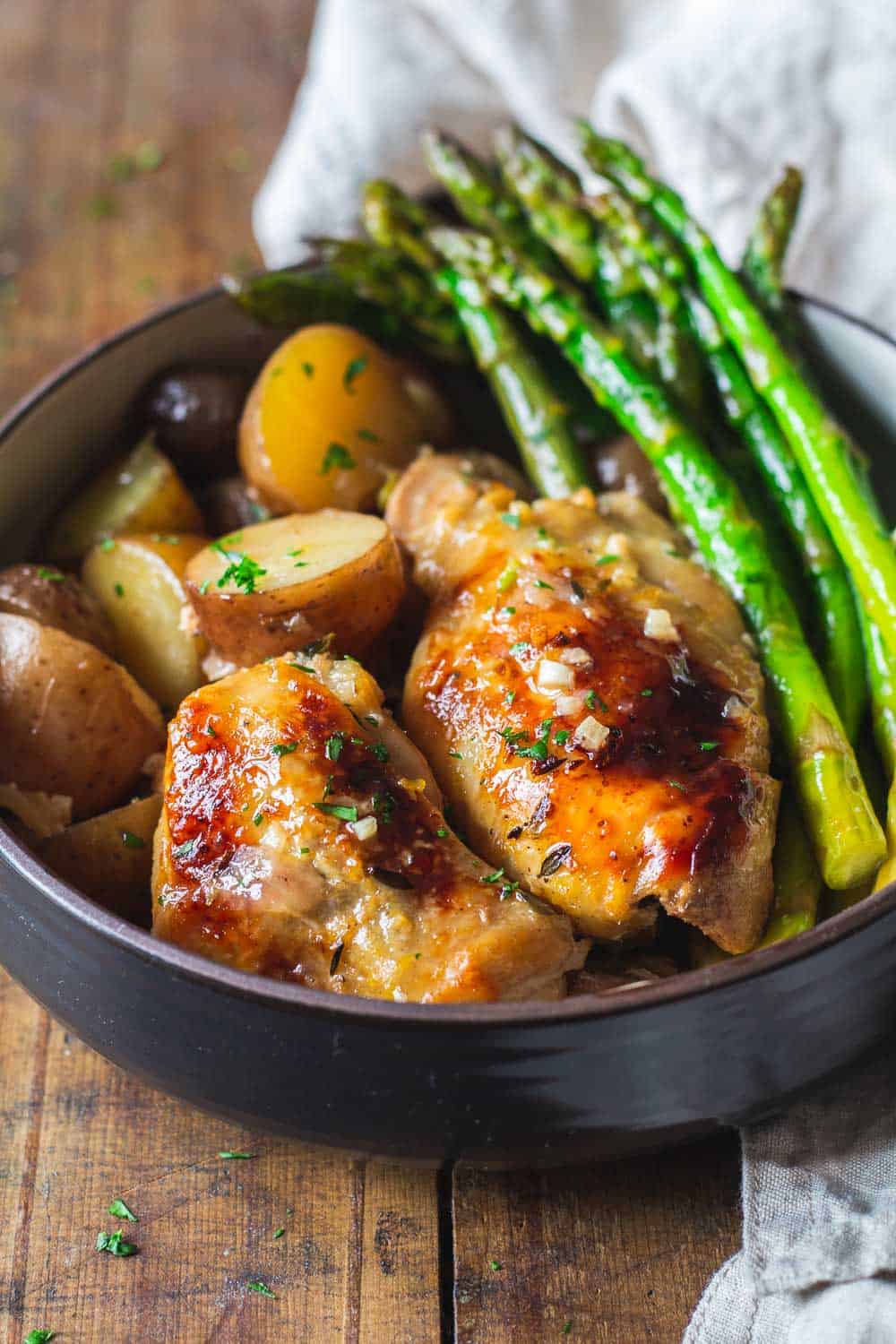 Slow-Cooker Lemon Chicken with potatoes and asparagus.