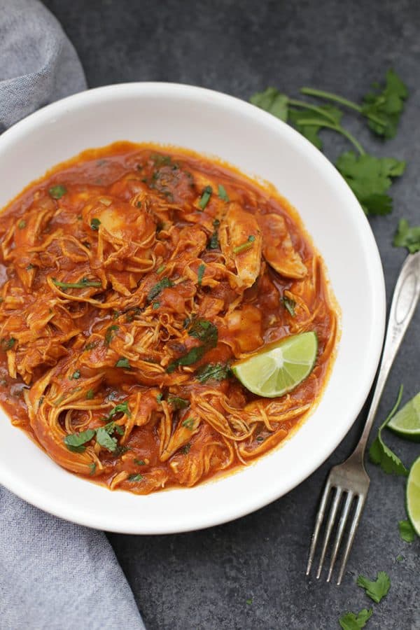 bowl of butter chicken made in a crockpot