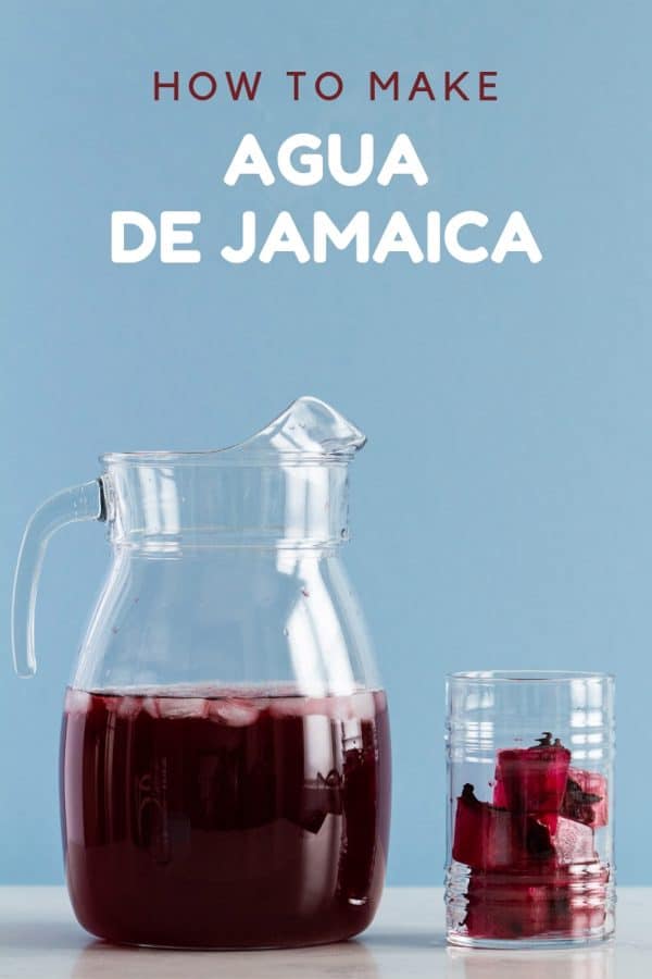 pitcher and drinking glass of Agua de Jamaica (hibiscus tea)