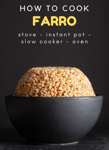 Raw Farro in a golden Measuring Cup
