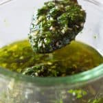 Chimichurri on a spoon and in a jar