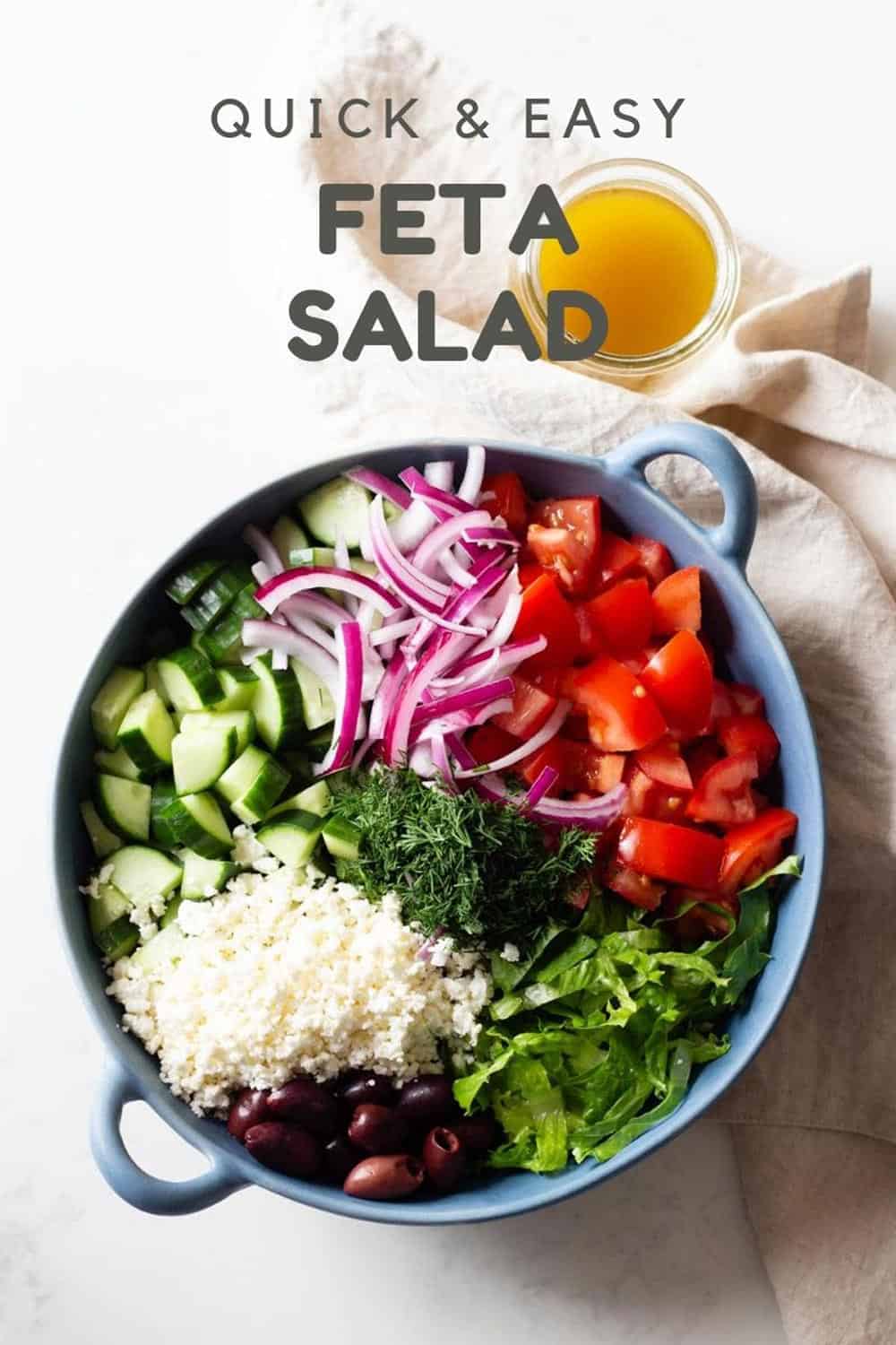 Feta Salad in a blue bowl with text overlay for Pinterest