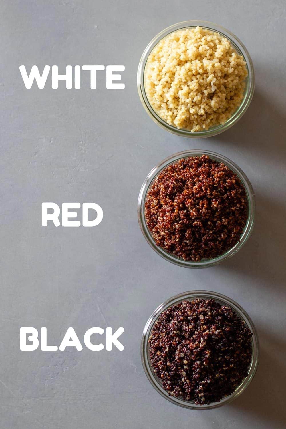 White quinoa, red quinoa, and black quinoa in bowls.