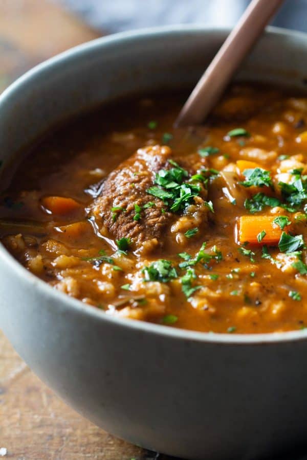 Closeup of texture of beef and barley soup