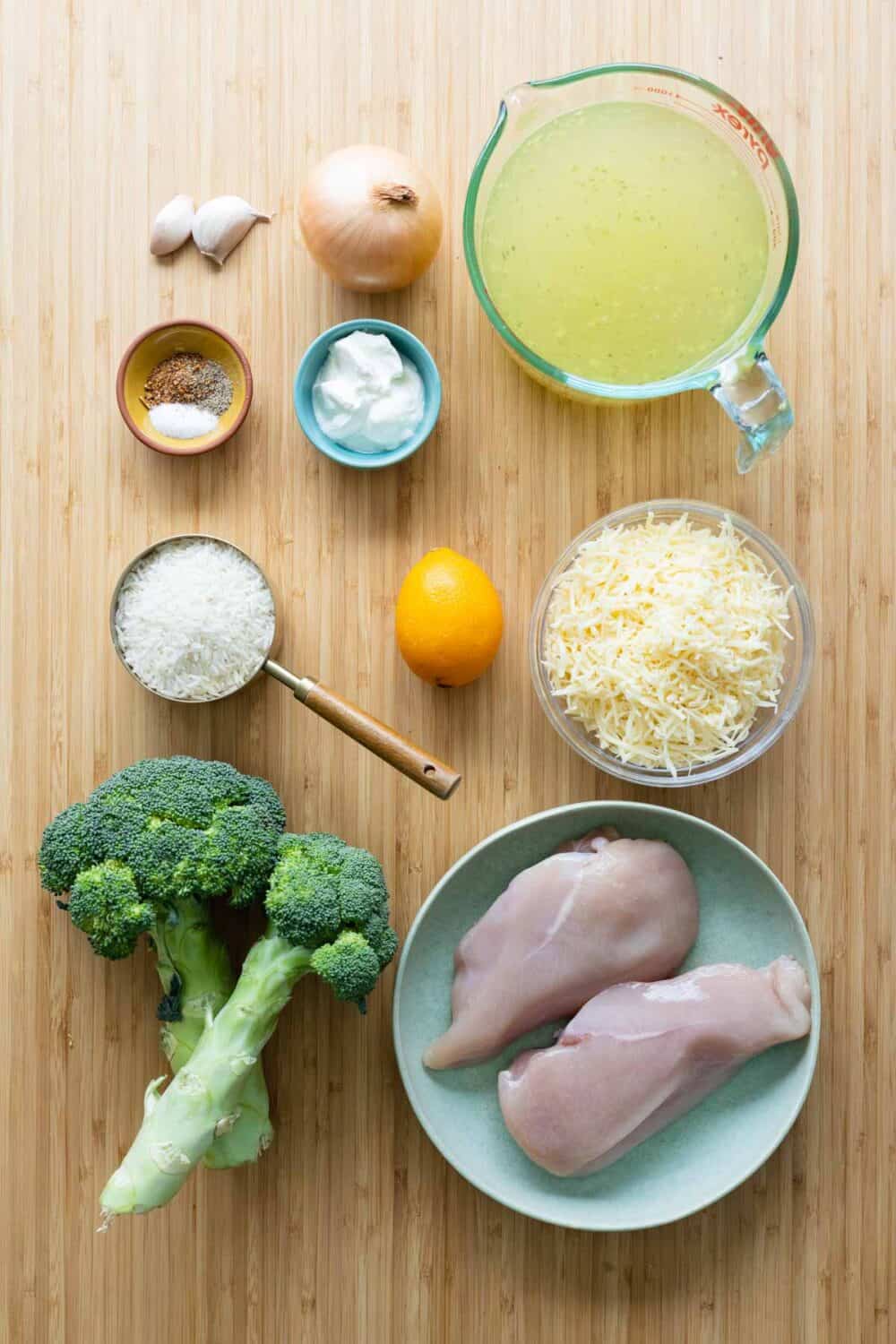 Ingredients for chicken and rice casserole laid out on a kitchen counter.