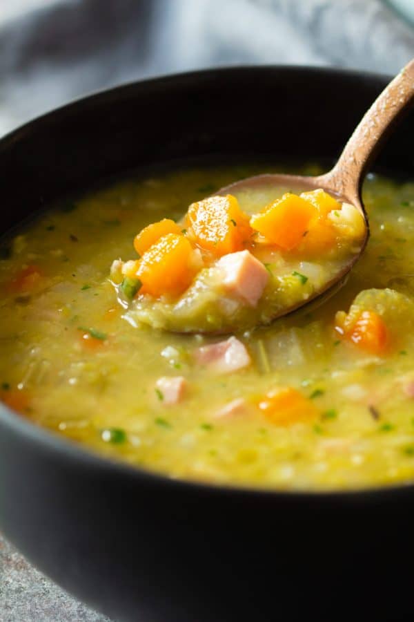 closeup of texture of instant pot split pea soup on a spoon