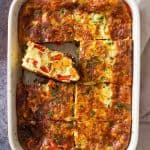 Sweet potato breakfast casserole in a red baking dish