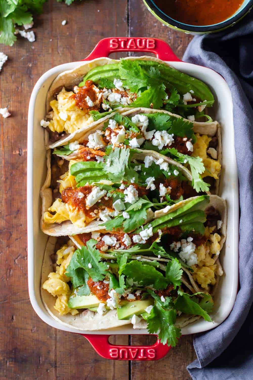 Breakfast Tacos lined up in a baking dish