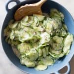 Creamy Cucumber Salad in a blue salad bowl