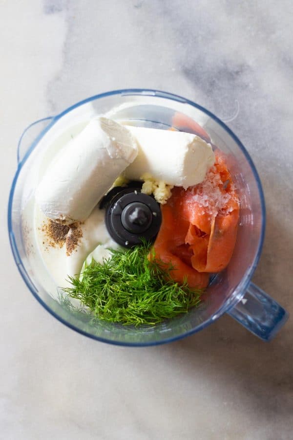 Ingredients for smoked salmon dip in a food processor