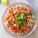 Pico de gallo in a glass bowl