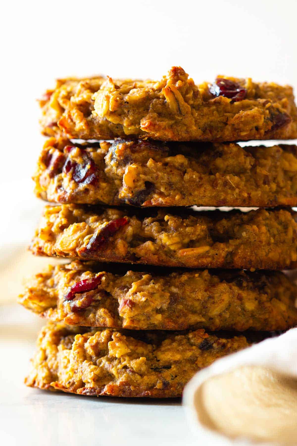 Five Oatmeal Breakfast Cookies stacked on top of each other.