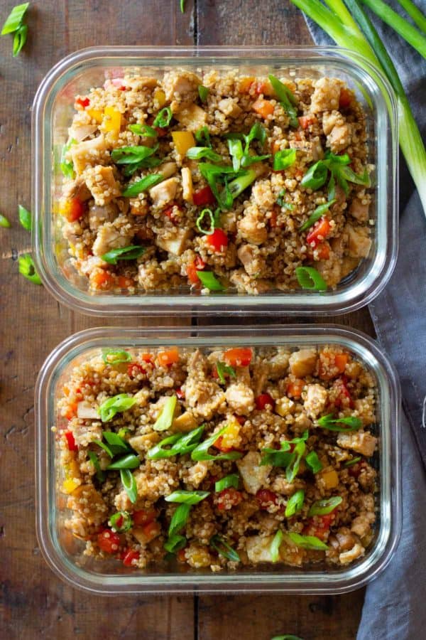 Quinoa Fried Rice in two glass meal prep containers.