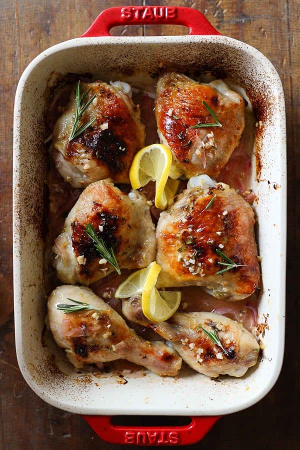 Cooked Rosemary Lemon Chicken in a baking dish.