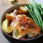 Rosemary Lemon Chicken with green beans and baby potatoes in a bowl.