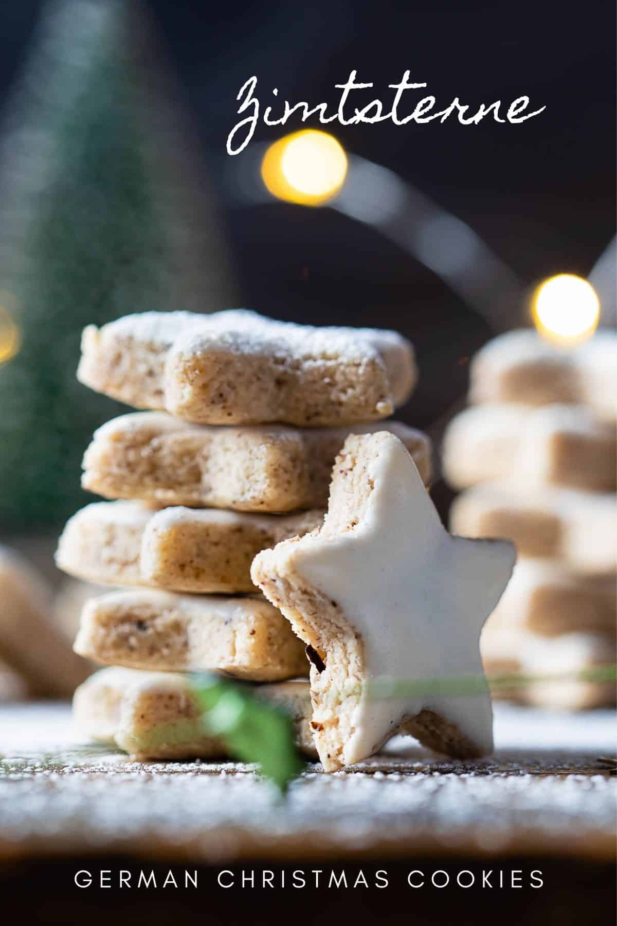 Zimtsterne, cinnamon stars, stacked one on top of the other and one leaning agains the stack.