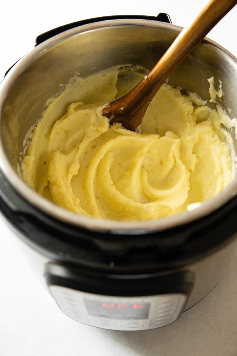 Creamy mashed potatoes in an Instant Pot. Instant Pot Mashed Potatoes recipe