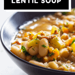 Close up of bowl of instant pot lentil soup with text overlay for Pinterest.